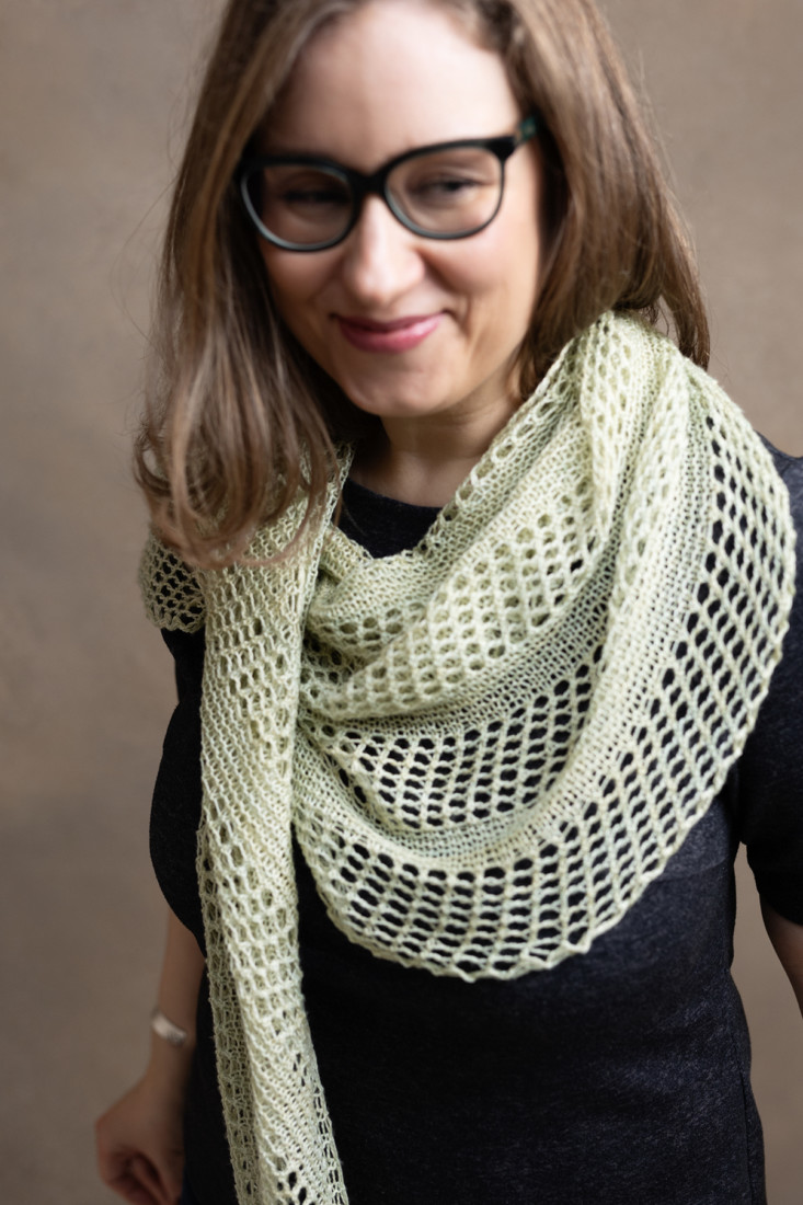 Wind Whisper – Beginner lace shawl knitting pattern with garter stitch and simple eyelets.